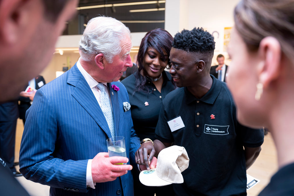 Founder of Jerry J Clothing Lamin Gibba Meets Prince Charles